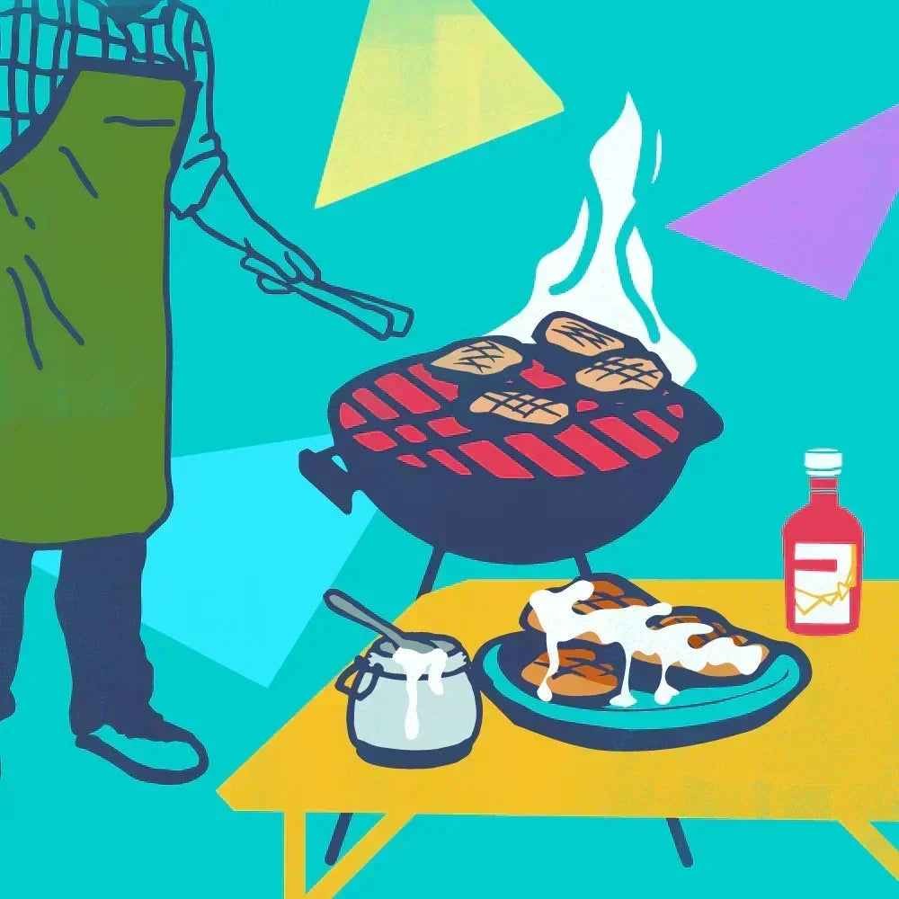 Person cooking chicken at a charcoal grill beside a table with white BBQ sauce bottles and plates