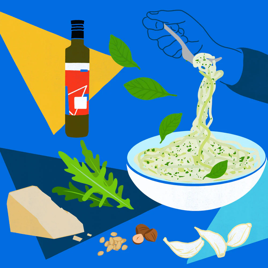 Bowl of pesto pasta being twirled by a fork, with a bottle of vinegar, Parmesan wedge, garlic, nuts and basil leaves.