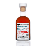 The front view of a bottle of American Vinegar Works Apple Cider Vinegar, featuring a white and red "19.53 Miles From The Tree" label against a clean white background.