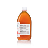 side view of a 1 liter apple cider vinegar bottle on a white background
