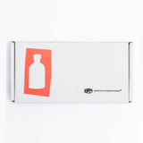 White American Vinegar Works product box featuring a red bottle graphic and company logo.