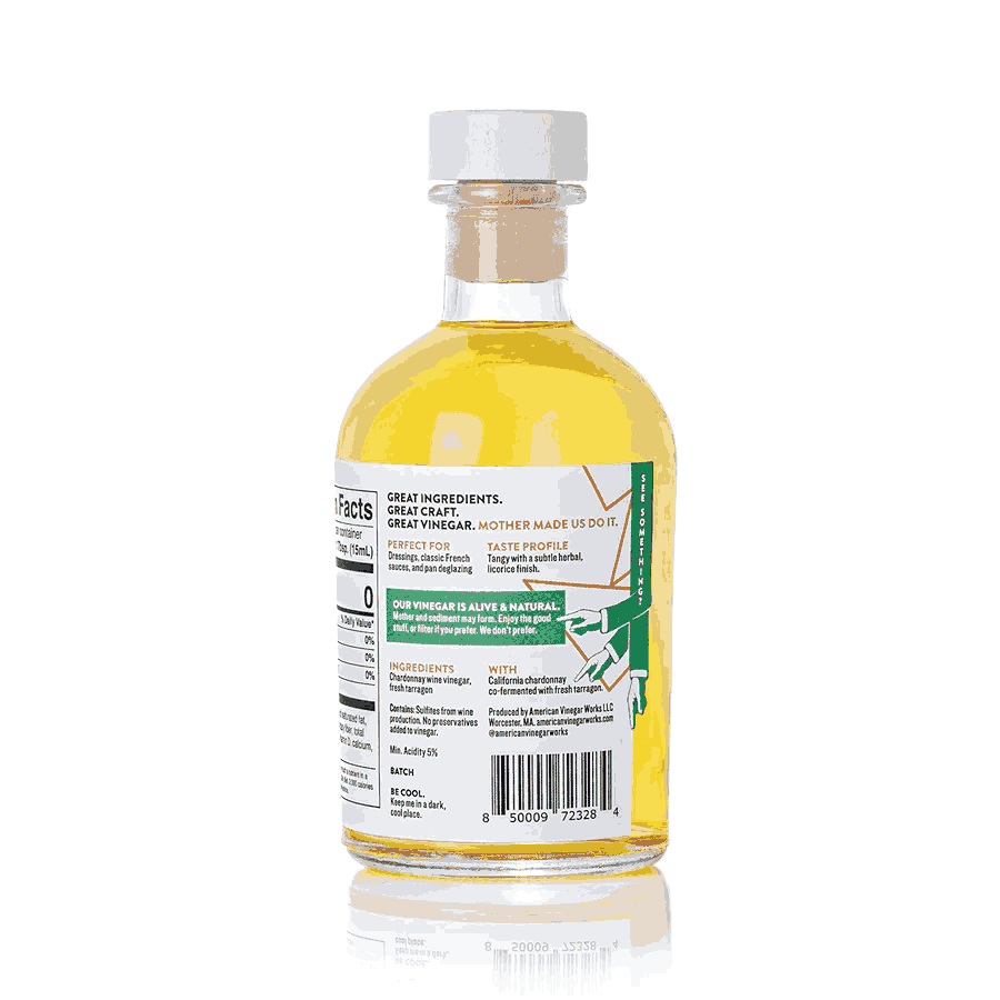 A detailed back view of an 8.5 fluid ounce bottle of American Vinegar Works California Chardonnay Tarragon Wine Vinegar, showcasing the perfect food pairings, a taste profile described as tangy with a subtle herbal licorice finish, and the nutrition facts panel against a white background.