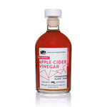 Single 8.5 fl oz bottle of Cranberry Apple Cider Vinegar with a pink "sweet & tangy" label.