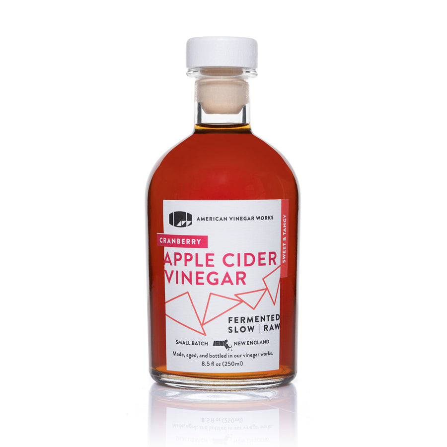 Single 8.5 fl oz bottle of Cranberry Apple Cider Vinegar with a pink "sweet & tangy" label.