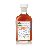 Bottle of Octoberfest Beer Malt Vinegar with a label on a white background
