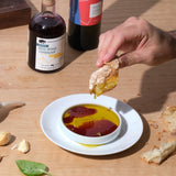 Bread dipped in olive oil and vinegar