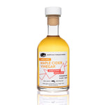 Front view of 250ml bottle of Maple Cider Vinegar with barrel-aged label on white background.