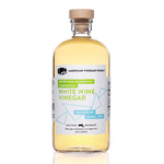 White Wine Vinegar clear glass bottle with cork stopper — artisanal wine vinegar