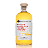 `California Sherry Vinegar liter glass bottle on white background — artisanal sherry vinegar`