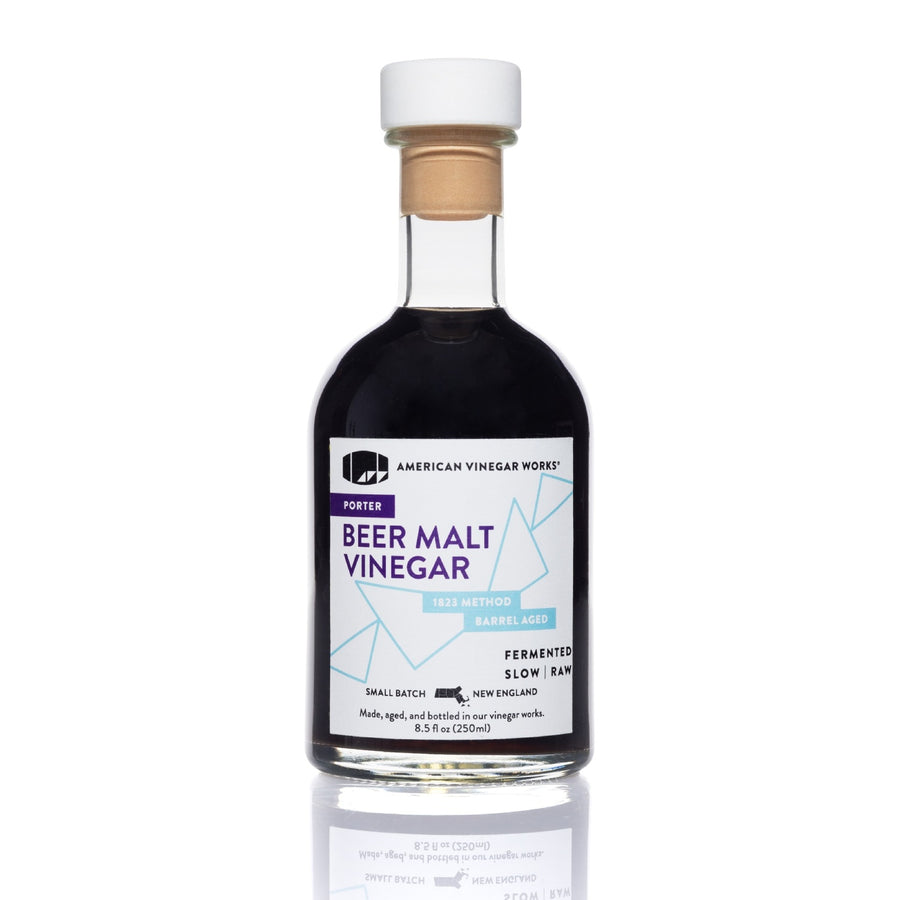 Beer Malt Vinegar dark glass bottle on white background — artisanal malt vinegar